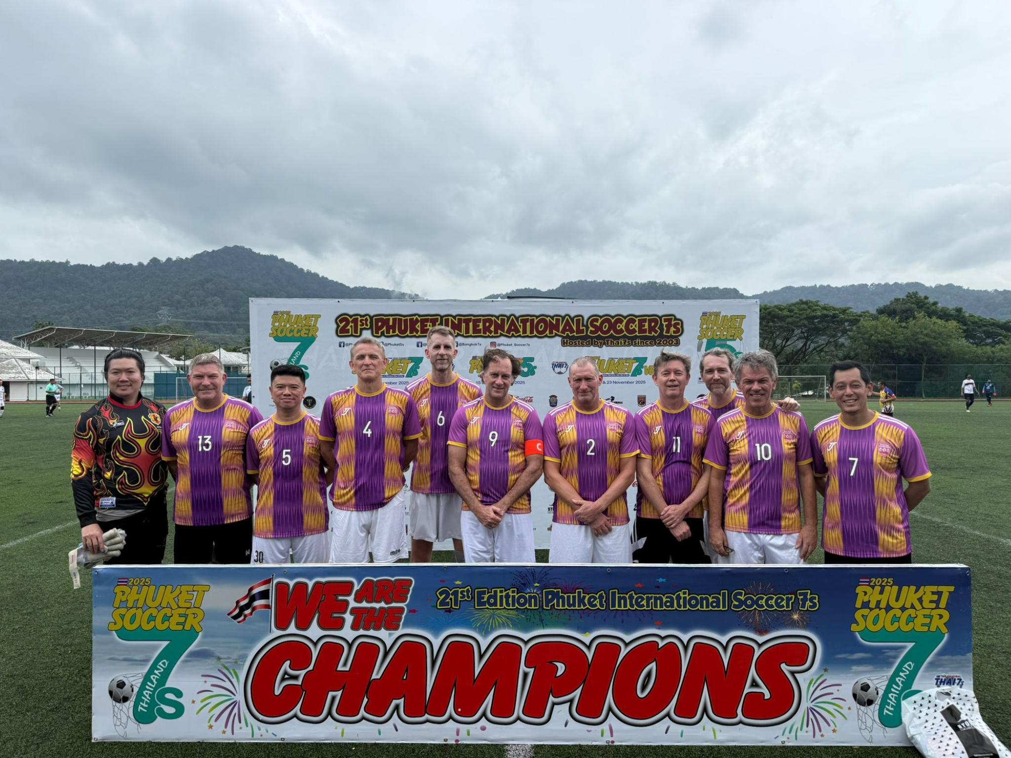 Championship team photo in purple jerseys
